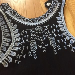 Black and white tank top with designs